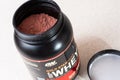 Kiev, Ukraine - May 31, 2020: An open jar of Ã¢â¬Åoptimum nutritionÃ¢â¬Â protein powder whey protein gold standard with strawberry